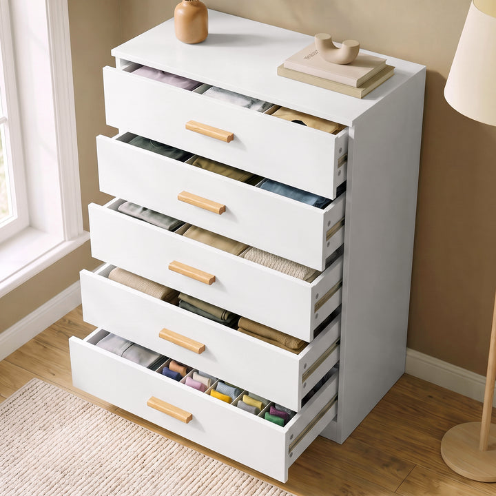 [White] High-angle view of the White Tall 5 Drawer Chest with all five drawers pulled open showing storage space.
