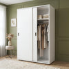 [White] Torvek large sliding wardrobe side angled view in bright neutral bedroom with sheer curtains
