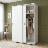 [White] Torvek large sliding wardrobe side angled view in bright neutral bedroom with sheer curtains