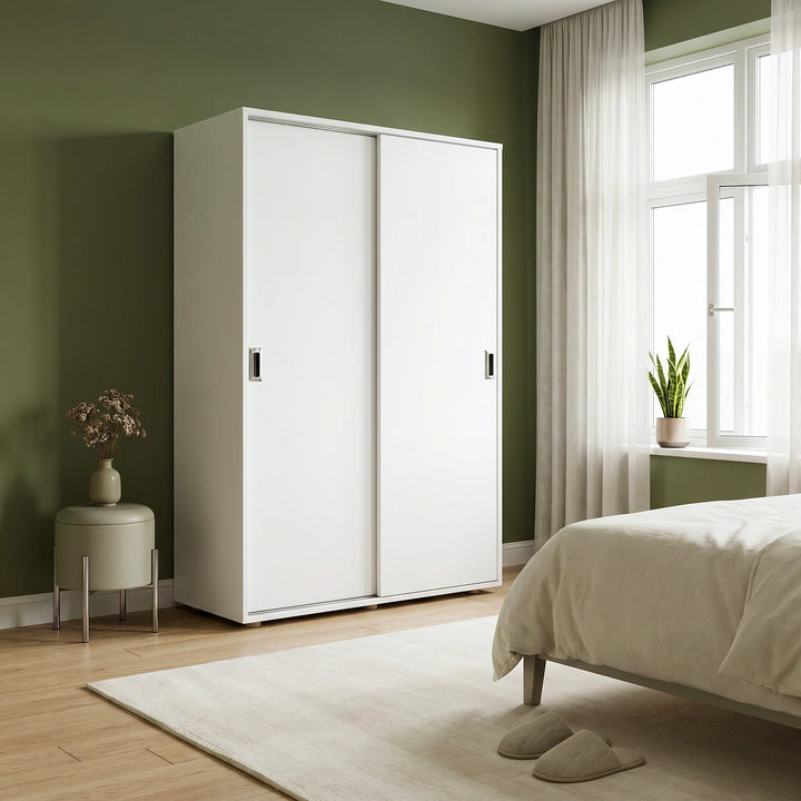 [White] White wardrobe in a bedroom with a bed, rug, and window.