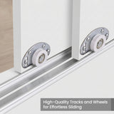 [White] Torvek wardrobe close-up of white sliding door roller wheels on aluminium bottom track rail