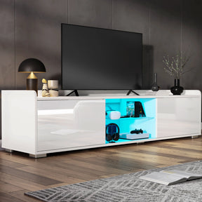 Modern white TV stand with a television mounted on a gray wall.