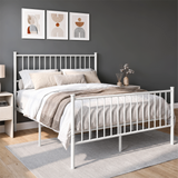 [White | Double] Angled view of white metal bed with bedding, tall bar headboard, matching footboard and centre support legs.