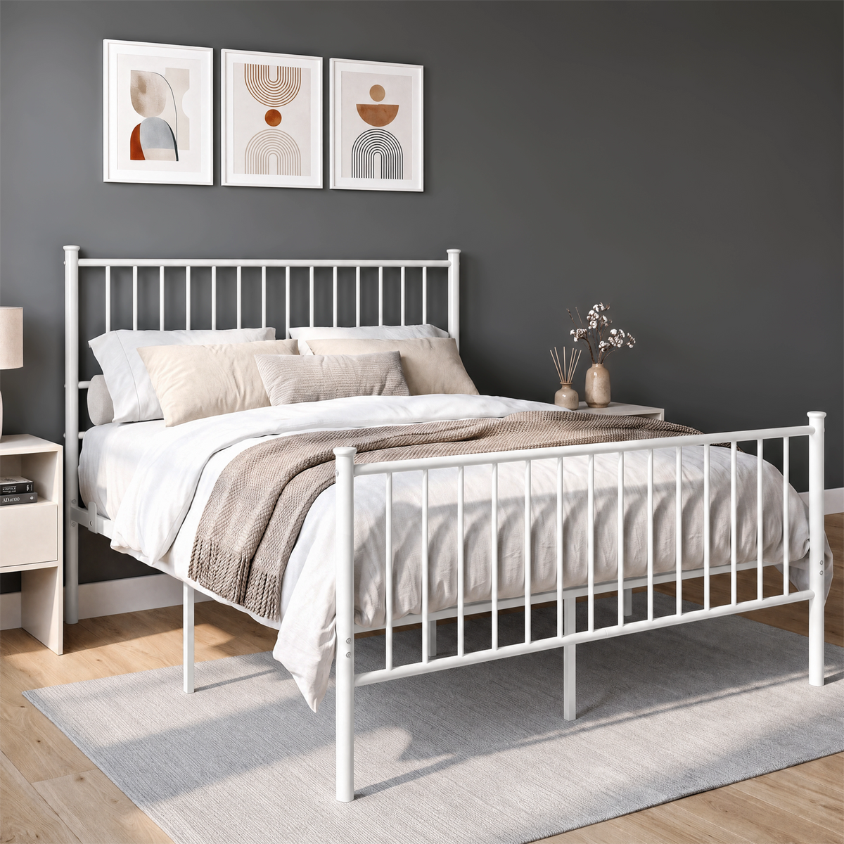 [White | Double] Angled view of white metal bed with bedding, tall bar headboard, matching footboard and centre support legs.