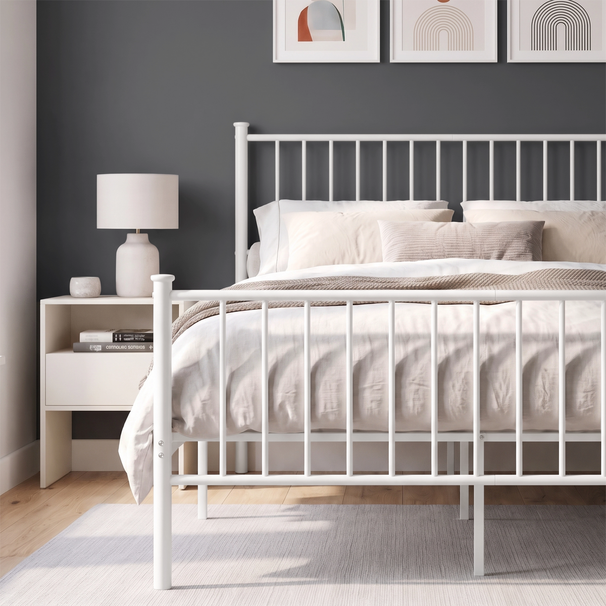 [White | Double] Metal bed front close-up view of white bar footboard, tall headboard, neutral bedding & centre support legs.