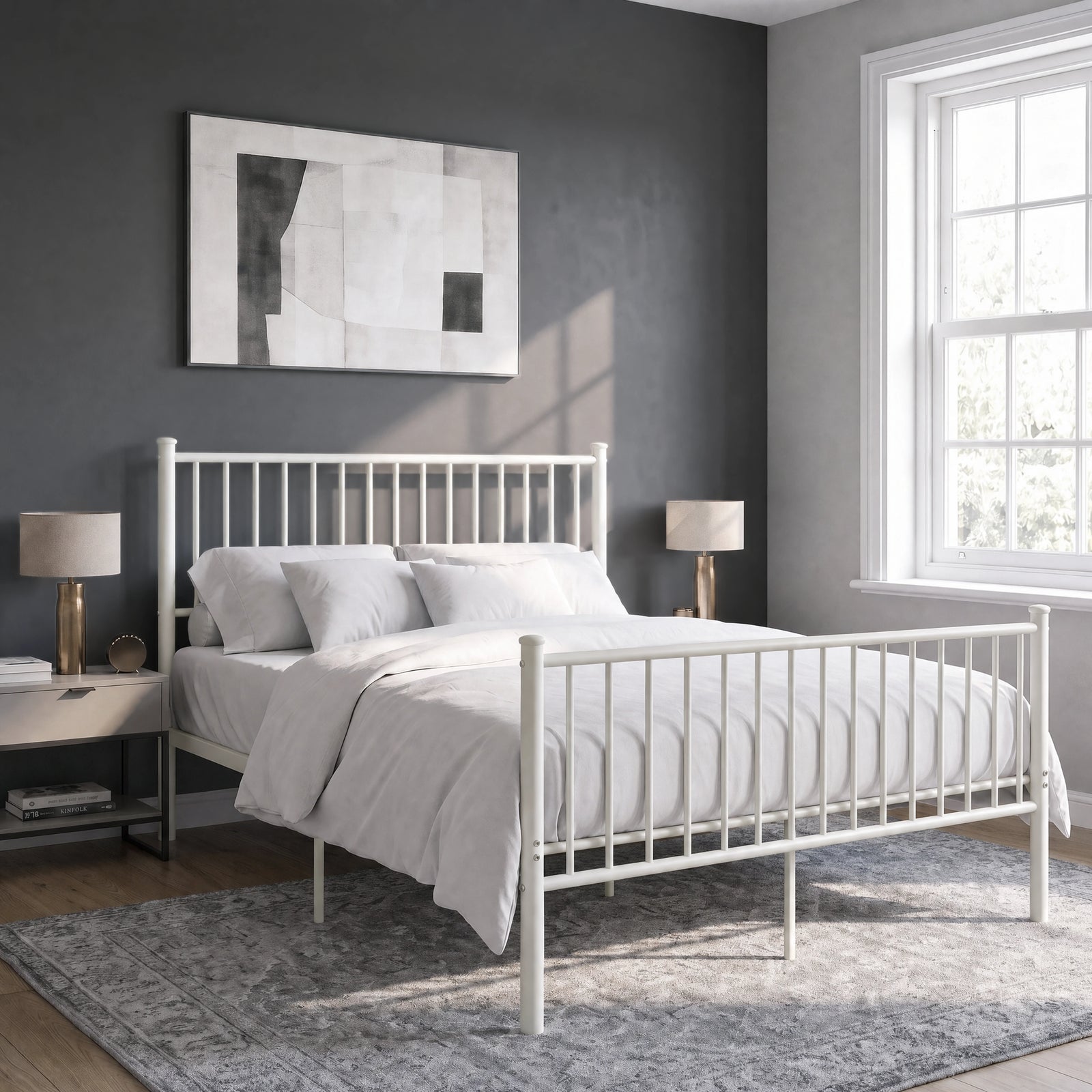 [White | King] Angled view of metal bed with white bedding, bar ends, centre legs, bedside lamps, wall art and bright window.