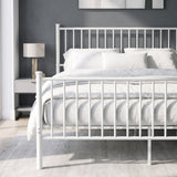 [White | King] Metal bed front close-up view of bar headboard and footboard, white bedding, centre legs, bedside table & lamp