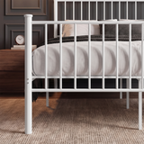 [White | Double] Close-up detail of the white metal double bed frame vertical slatted footboard.