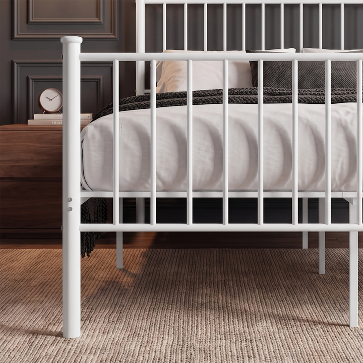 [White | Double] Close-up detail of the white metal double bed frame vertical slatted footboard.