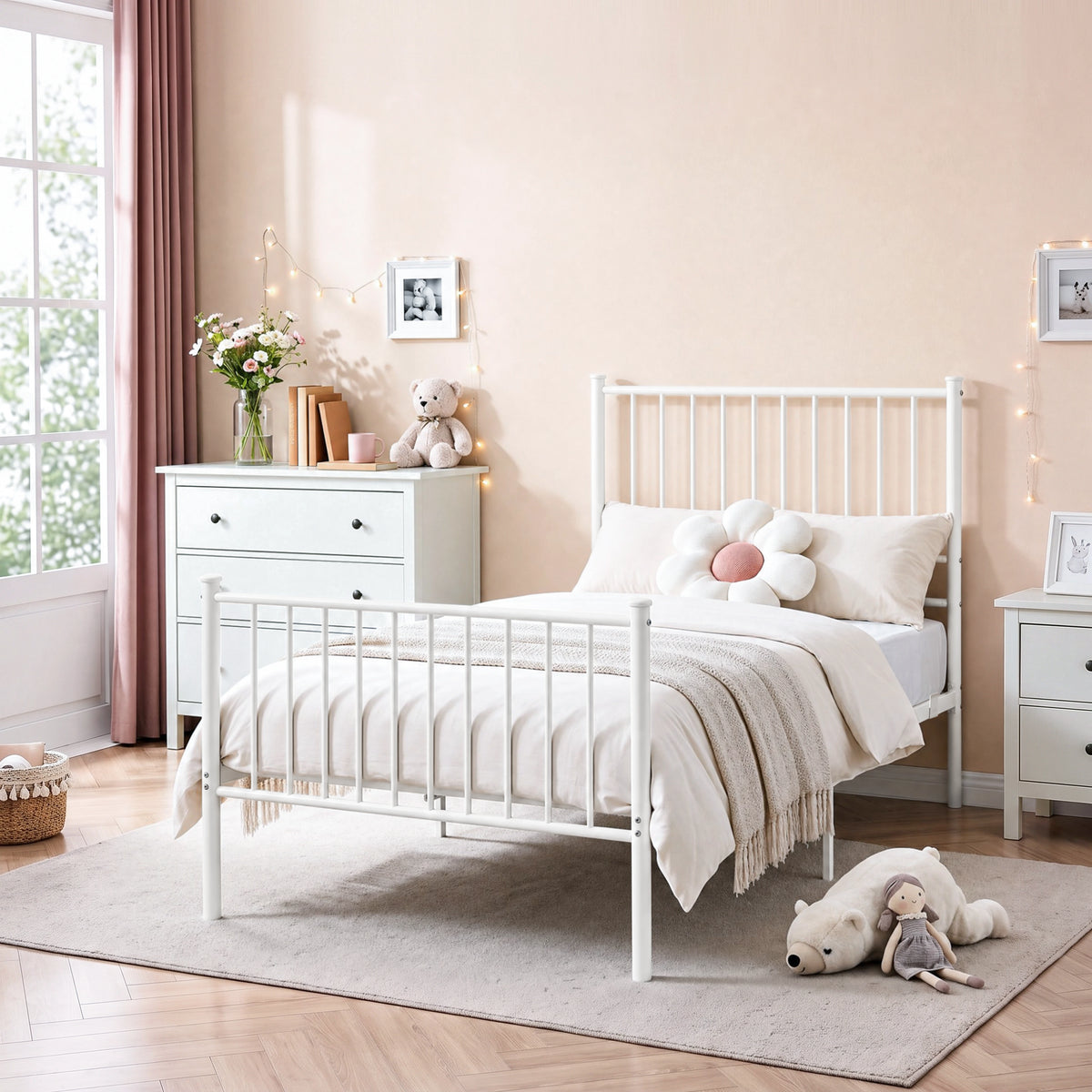 [White | Single] Metal bed styled with white bedding, flower cushion, beige throw, dresser, teddy, doll and string lights.