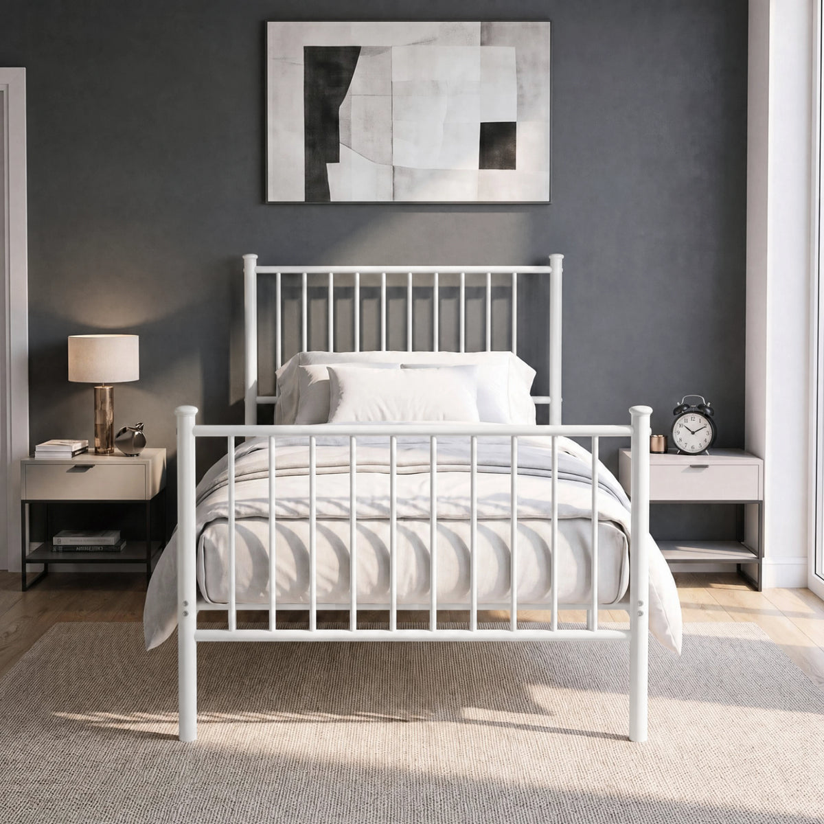 [White | Single] Front view of vertical iron bed with white-grey bedding, bar ends, centre leg, wall art, lamp & alarm clock.