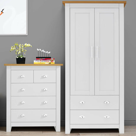 White wardrobe and chest of drawers with silver handles, minimalist design.