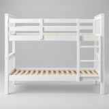 [White] Straight front view of the bunk bed frame showing ladder, upper guard rails and lower slatted base