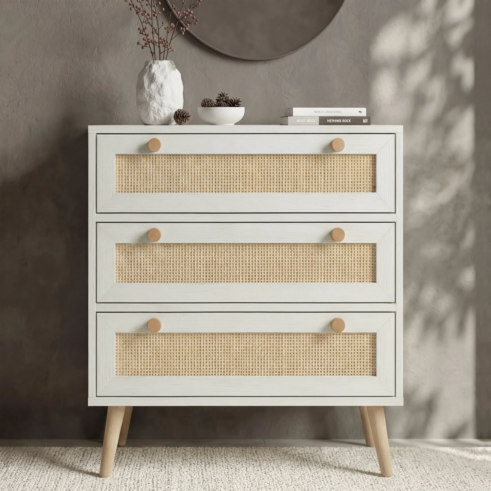 [White] Wovena rattan bedroom furniture set chest of drawers styled with vase, pinecones and round mirror