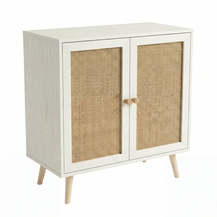 [White] Wovena rattan sideboard angled studio shot, both doors closed with knobs and splayed legs visible