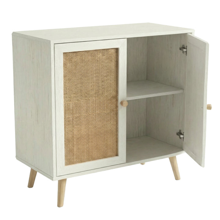 [White] Wovena rattan sideboard interior view, right door pulled open exposing fixed shelf and pine legs below