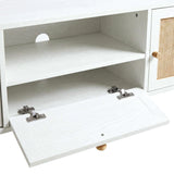 [White] Wovena Rattan TV Unit detail showing centre drop-down drawer with metal hinges, cable management hole, and adjustable shelf inside