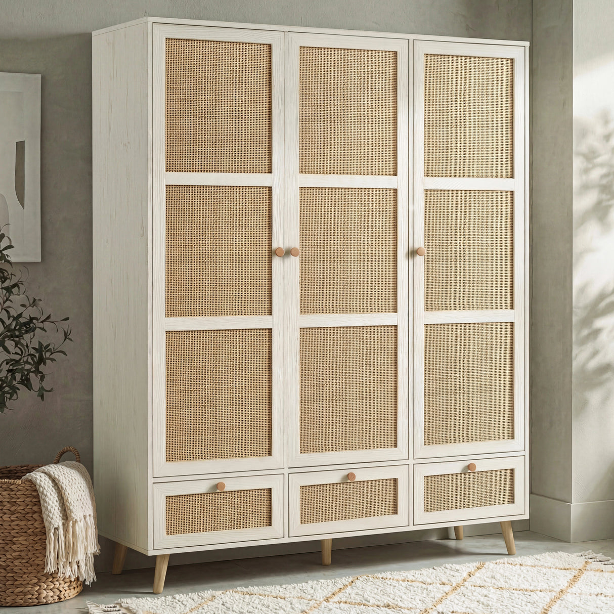 [White] Wovena rattan wardrobe three-quarter angle in a styled bedroom with natural light and wall shadows
