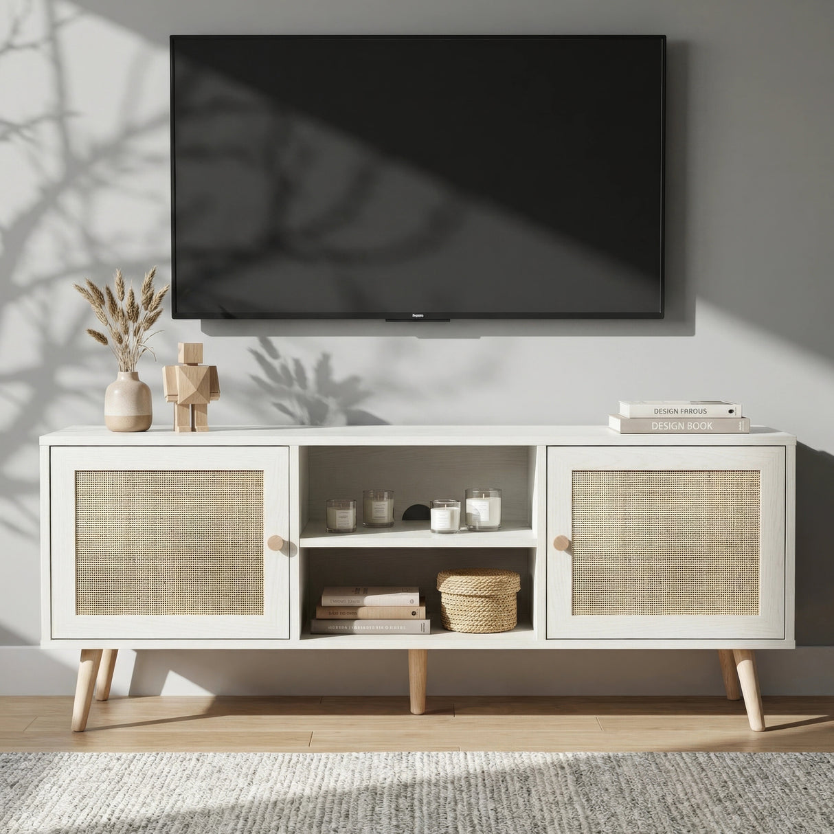 [White] Wovena lifestyle front view styled with dried pampas, candles, and woven basket beneath a wall-mounted TV