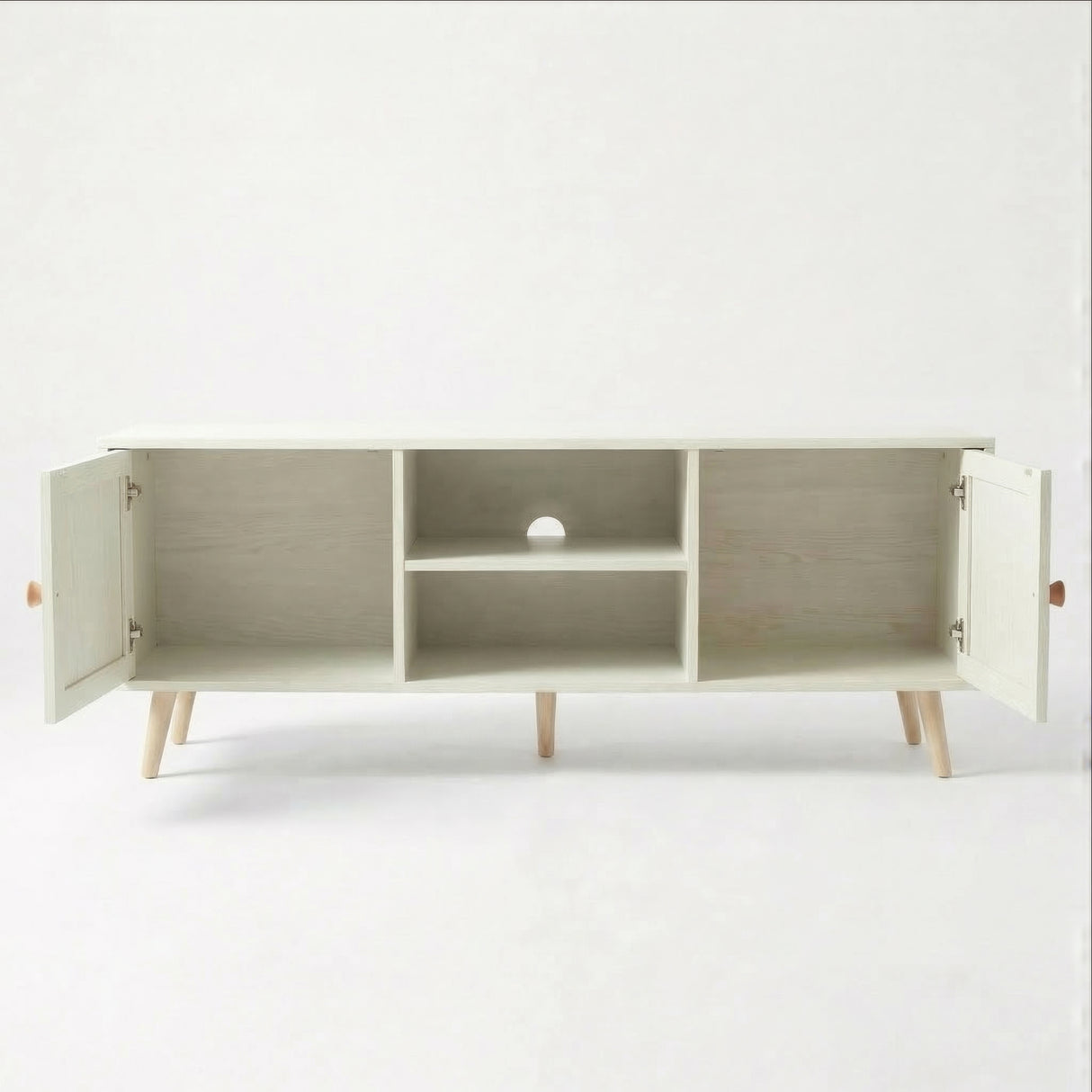 [White] Wovena open storage view with both rattan doors swung open, showing internal shelves, cable hole, and oak legs
