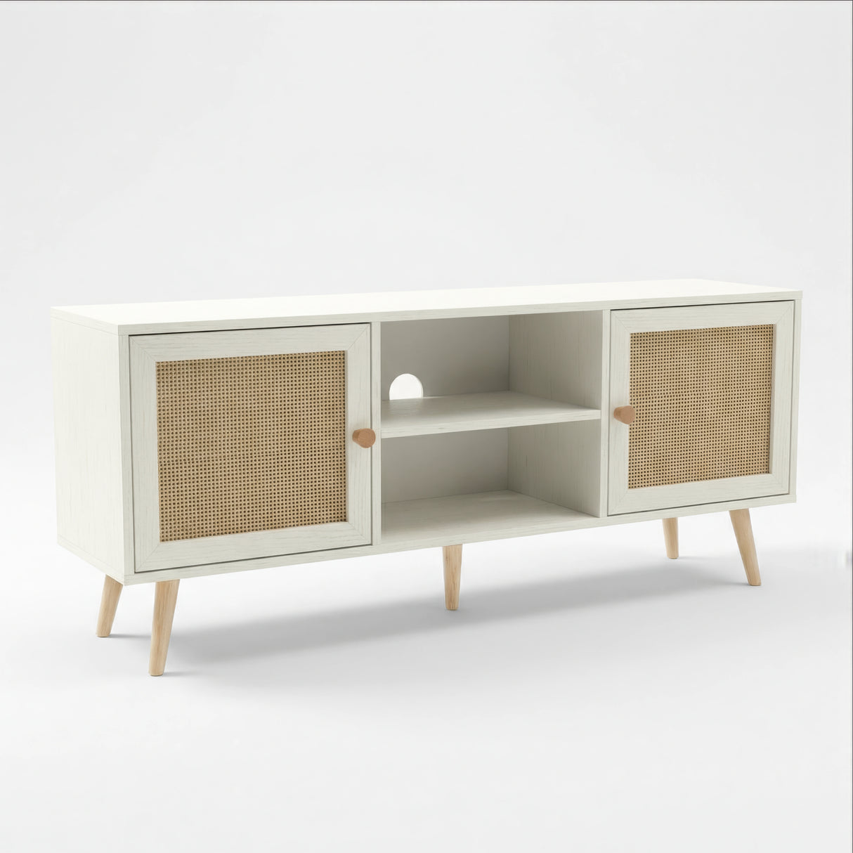[White] Wovena three-quarter angle showing rattan door panels, open centre shelving, and natural oak legs on white
