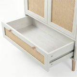 [White] Wovena 2 door wardrobe close-up of base drawer with rattan weave front, wooden knobs and smooth metal runner rail