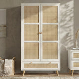 [White] Wovena wardrobe front view with rattan panelled 2 doors and base drawer styled against a warm grey wall