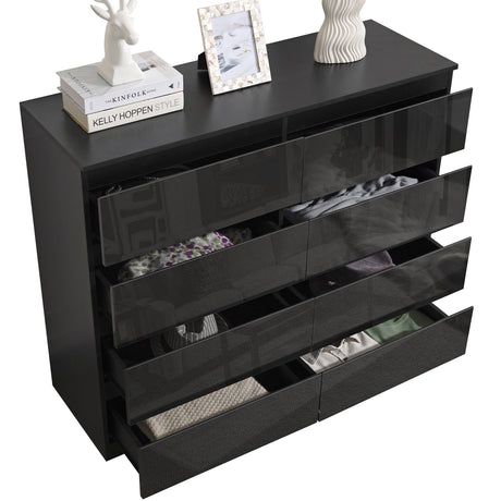 Wide black chest of drawers with a modern design, ideal for stylish and spacious storage.