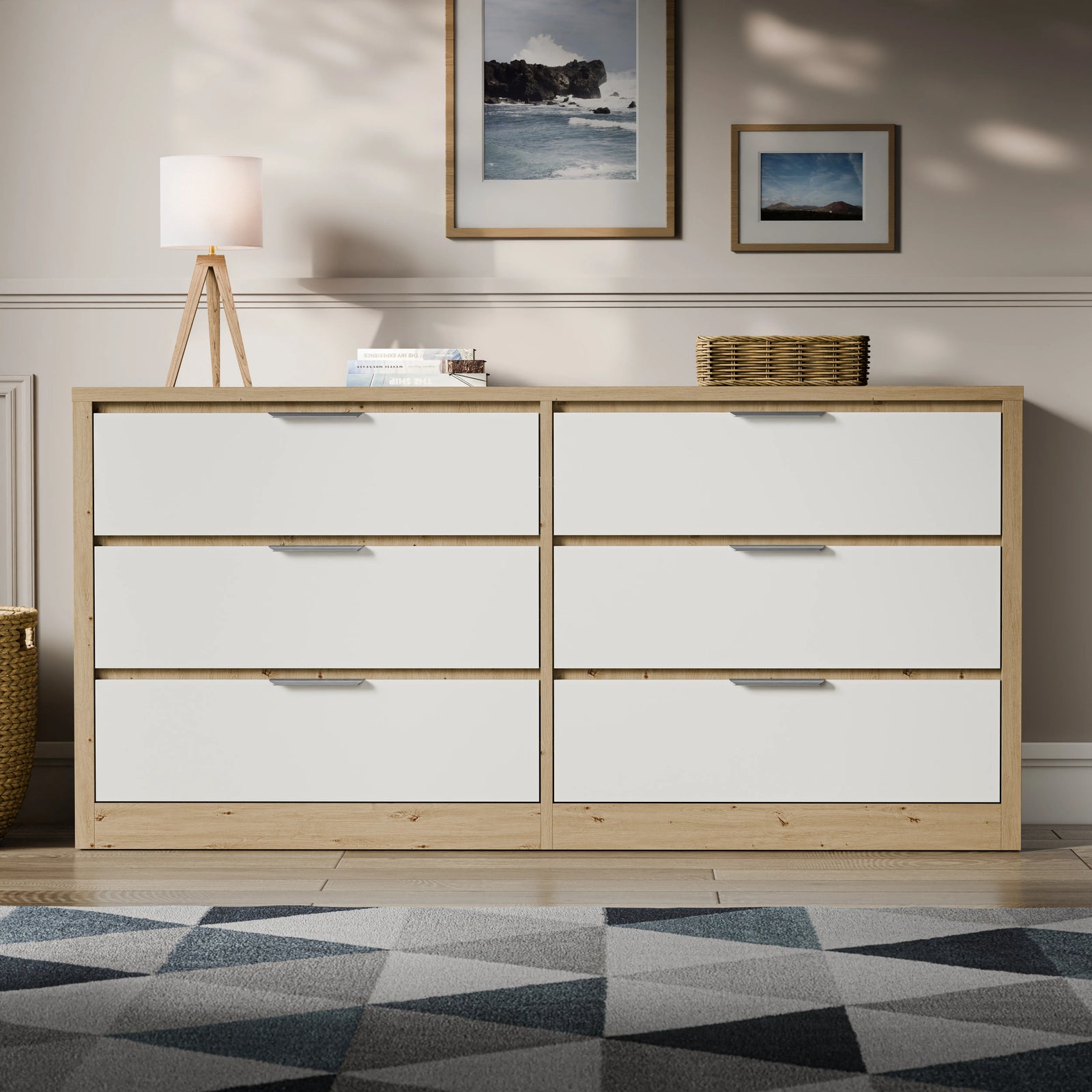 [Oak+White] Skova 6 drawer chest below framed seascape art with geometric rug in foreground