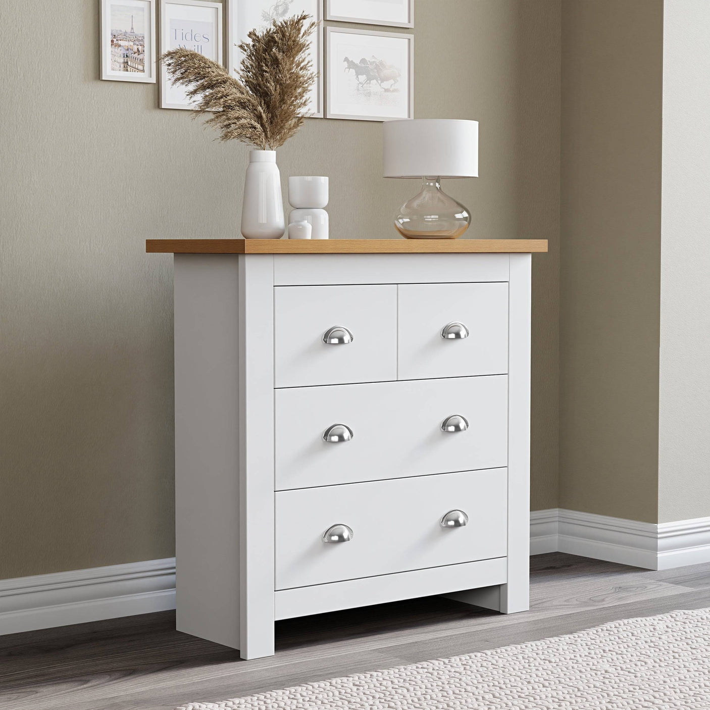 Wide chest of drawers white with a spacious top surface, elegantly adorned with flower pots.