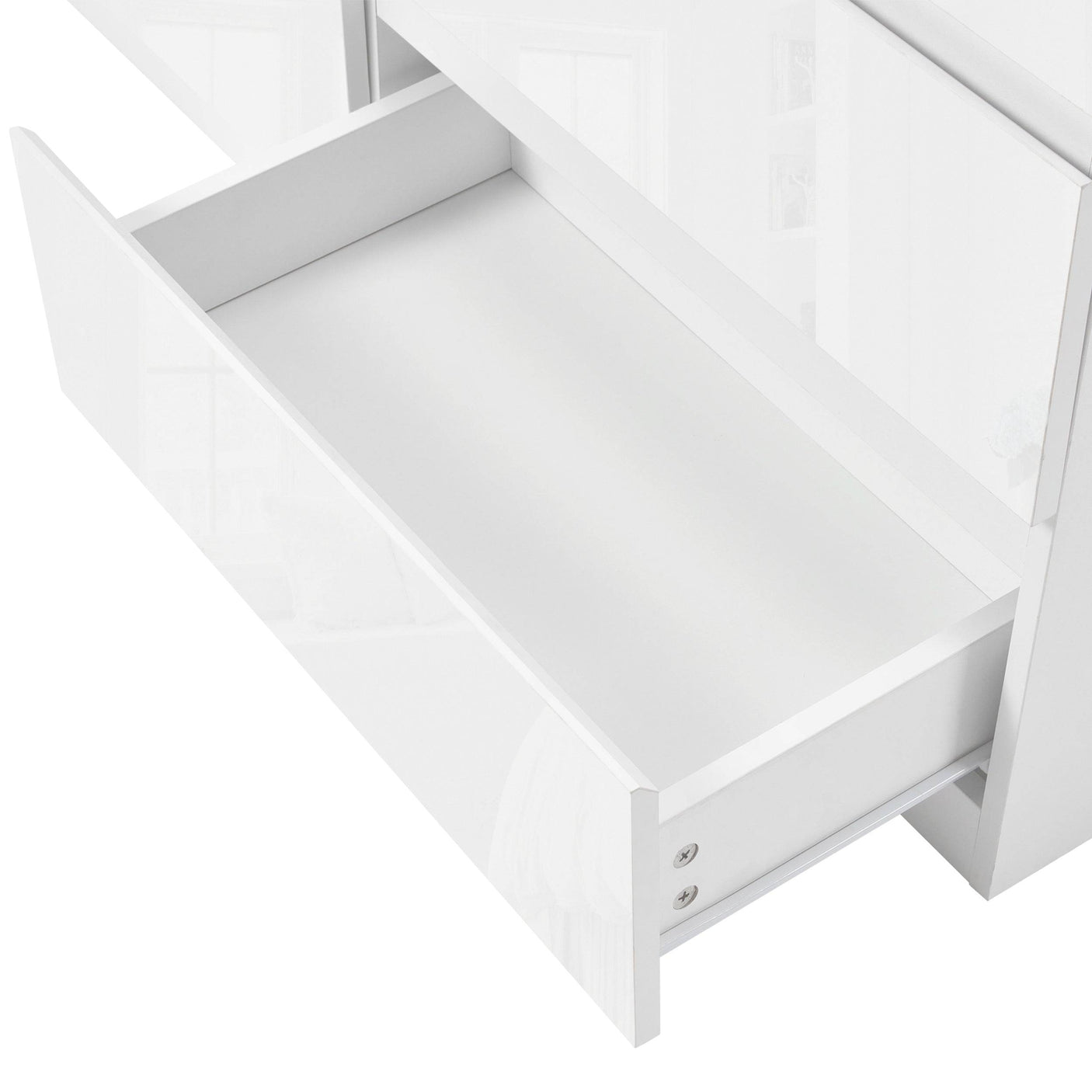 Wide white chest of drawers with high gloss finish, modern bedroom storage solution.