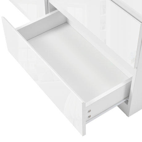 Wide white chest of drawers with high gloss finish, modern bedroom storage solution.