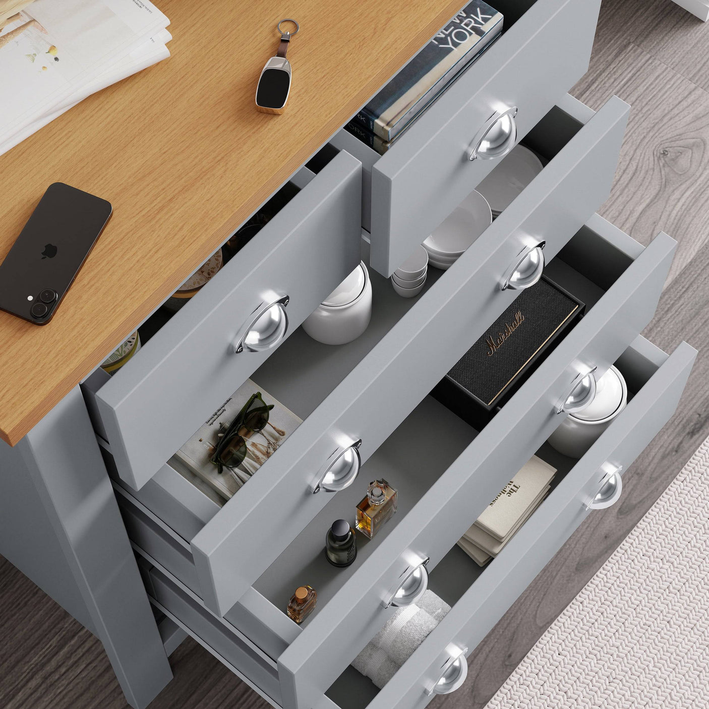 wide tall chest of drawers with open drawers, perfect for storing books and towels.