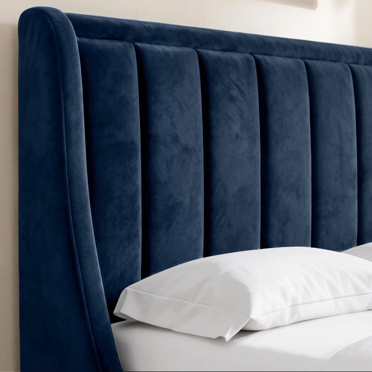 [Blue | King] Close-up of padded winged vertical panel headboard in plush velvet fabric