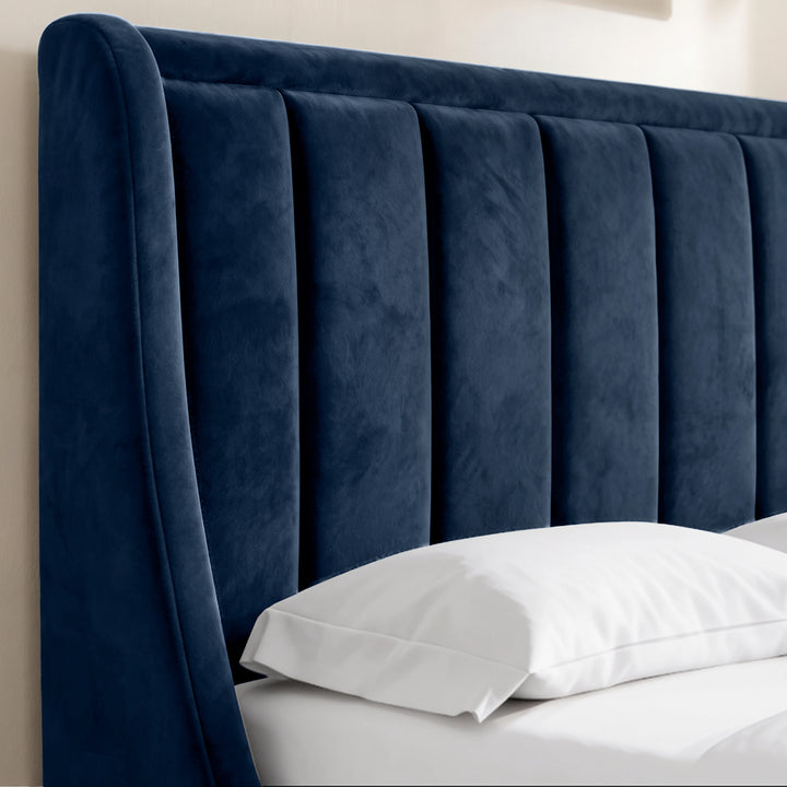 [Blue | King] Close-up of padded winged vertical panel headboard in plush velvet fabric