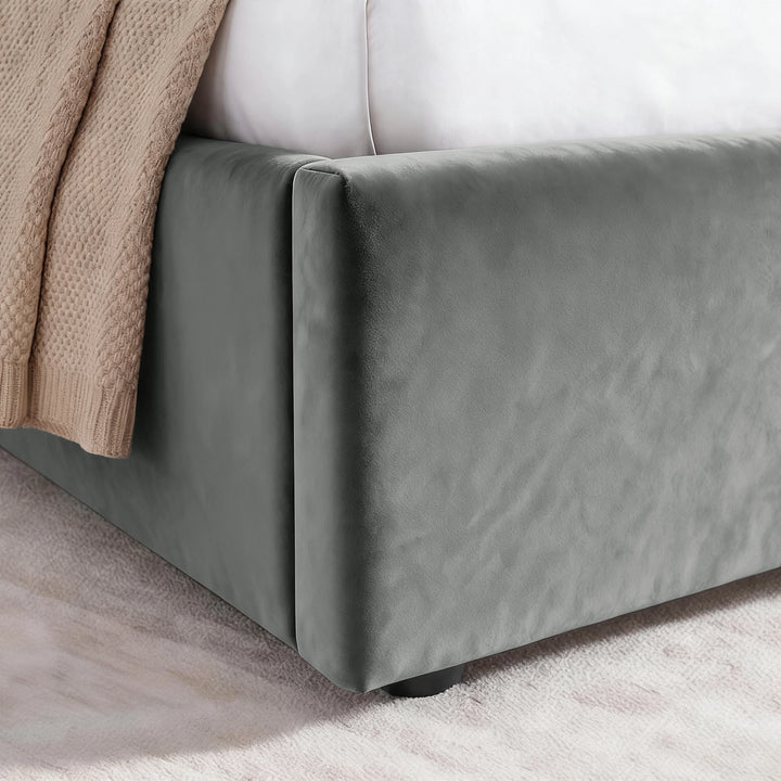 [Grey | King] Close-up of padded footboard corner showing plush fabric and Elevated bed base detail