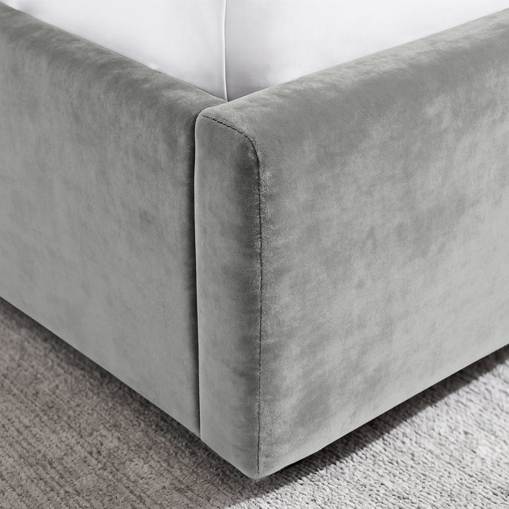 [Light Grey | King] Close-up of padded footboard corner showing plush fabric and Elevated bed base detail