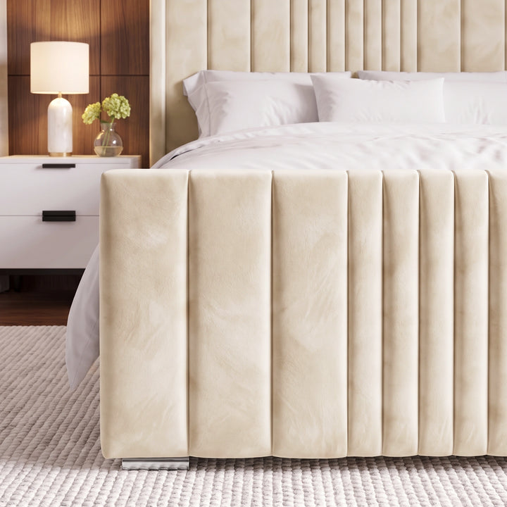 [King | Beige] Bed frame footboard close-up with knit throw draped and vertical channels below