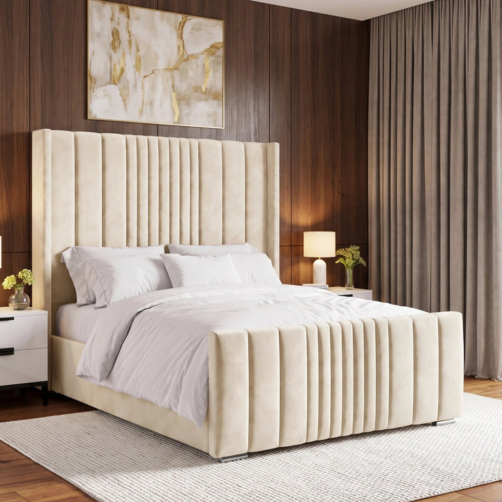 [King | Beige] Side angle of winged ottoman bed with vertical channel-stitched headboard and matching footboard
