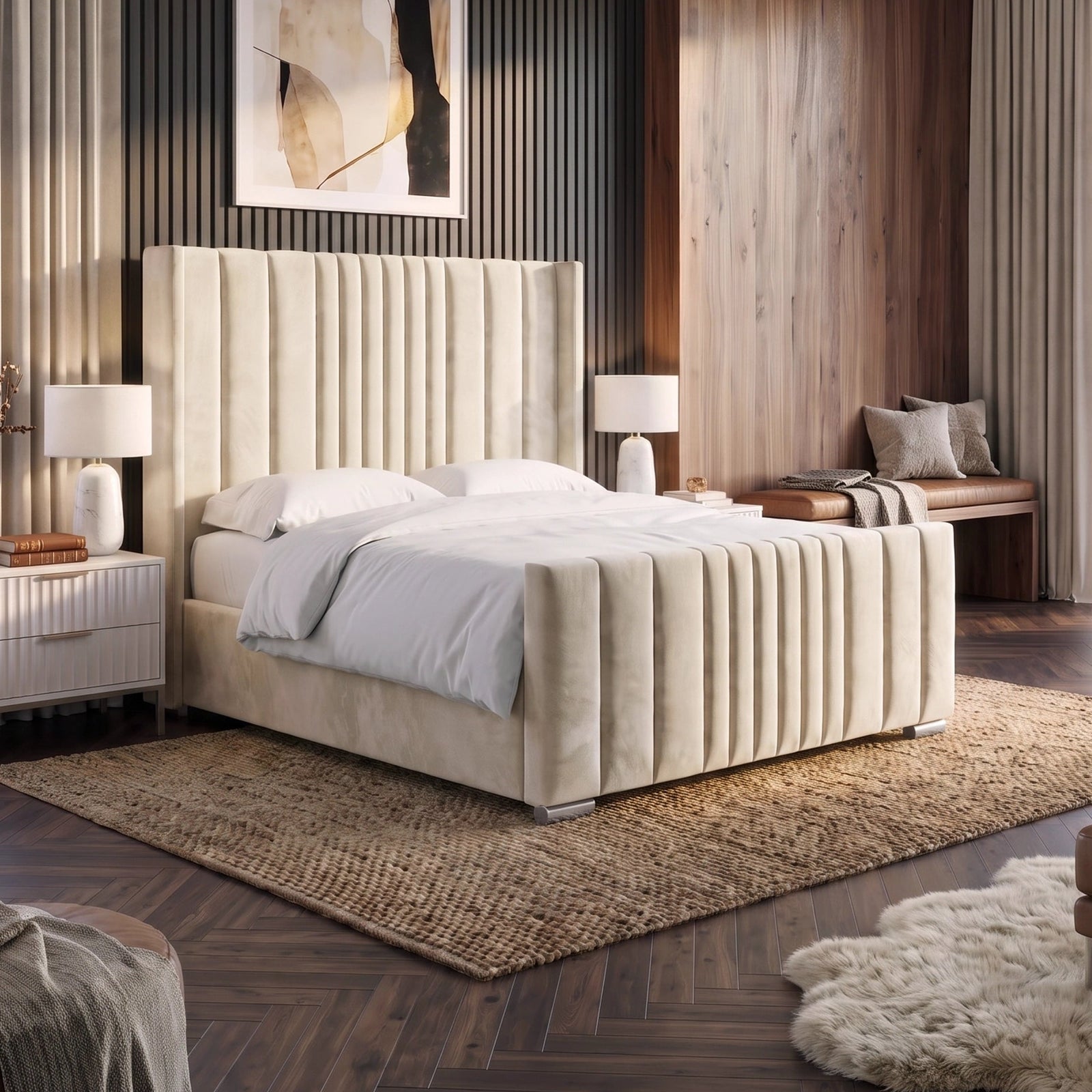 [Double | Beige] Winged ottoman bed upholstered bed with a tall channel-tufted headboard and matching footboard, styled in a modern bedroom with dark wood floors, a woven rug, bedside tables, lamps, and wall art.