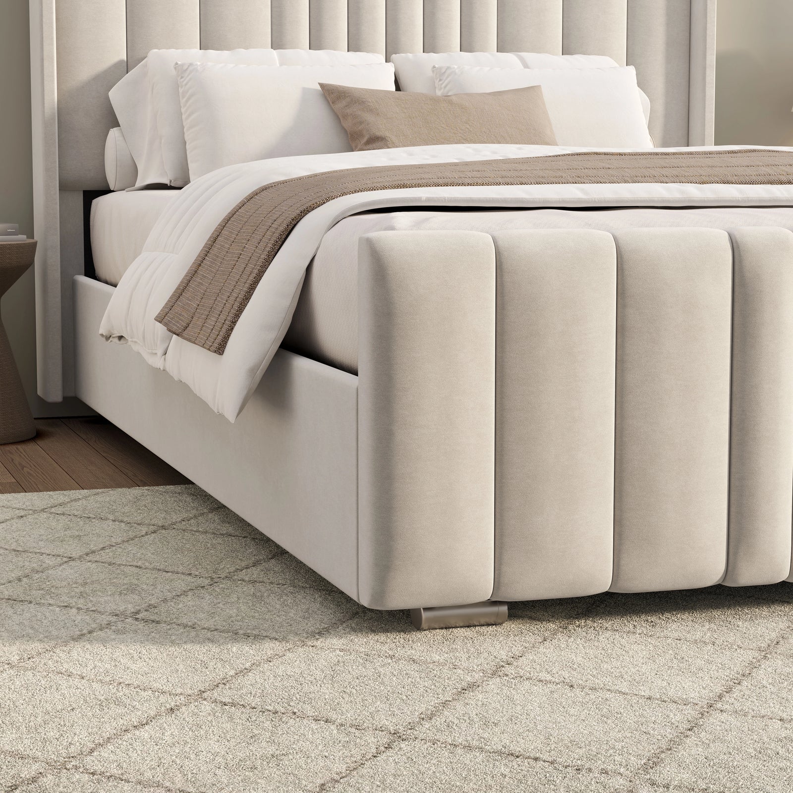 [King | Beige] Bed frame footboard close-up with knit throw draped and vertical channels below