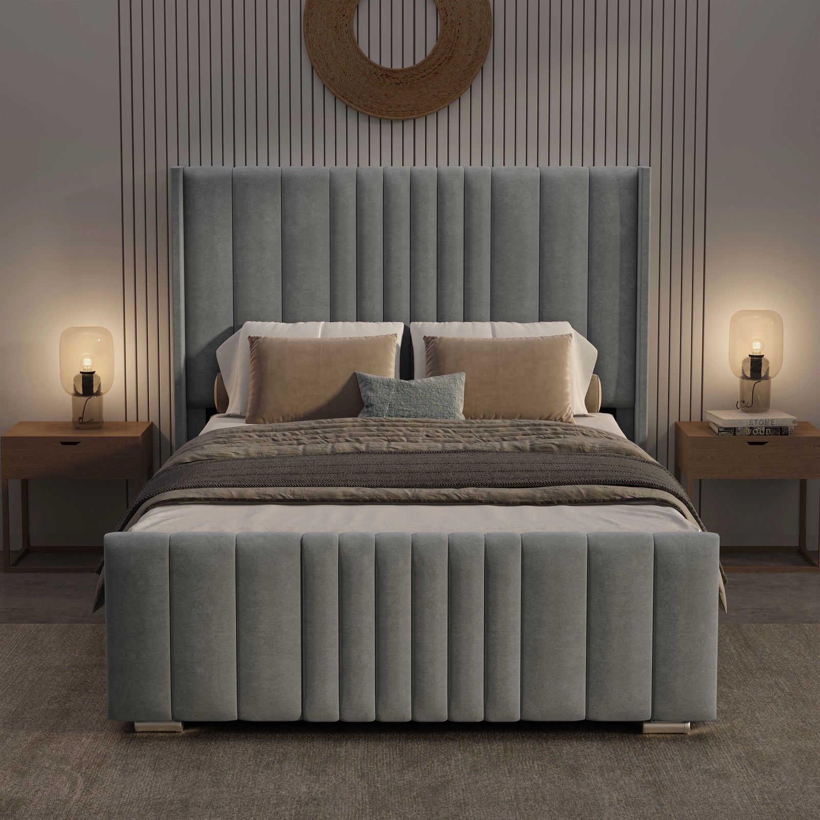 [King | Light Grey] Front view of winged ottoman bed at night with vertical channel headboard and warm ambient lamps