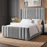 [King | Light Grey] Side angle of winged ottoman bed with vertical channel-stitched headboard and matching footboard