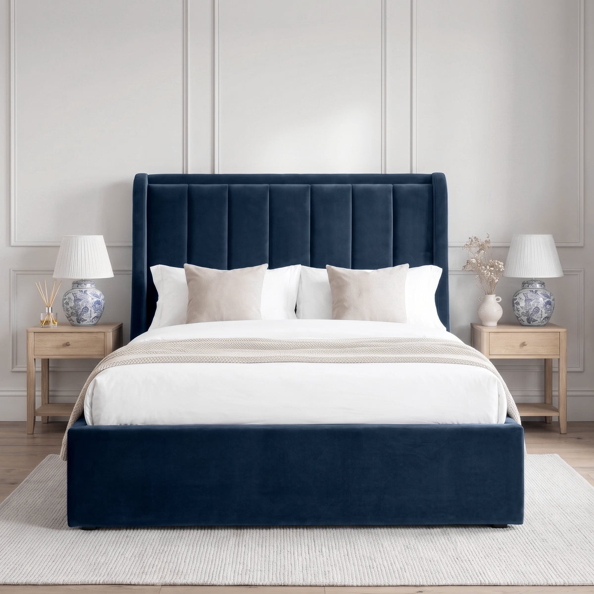 [Blue | Double] Winged ottoman storage bed front view with winged vertical panel headboard and footboard