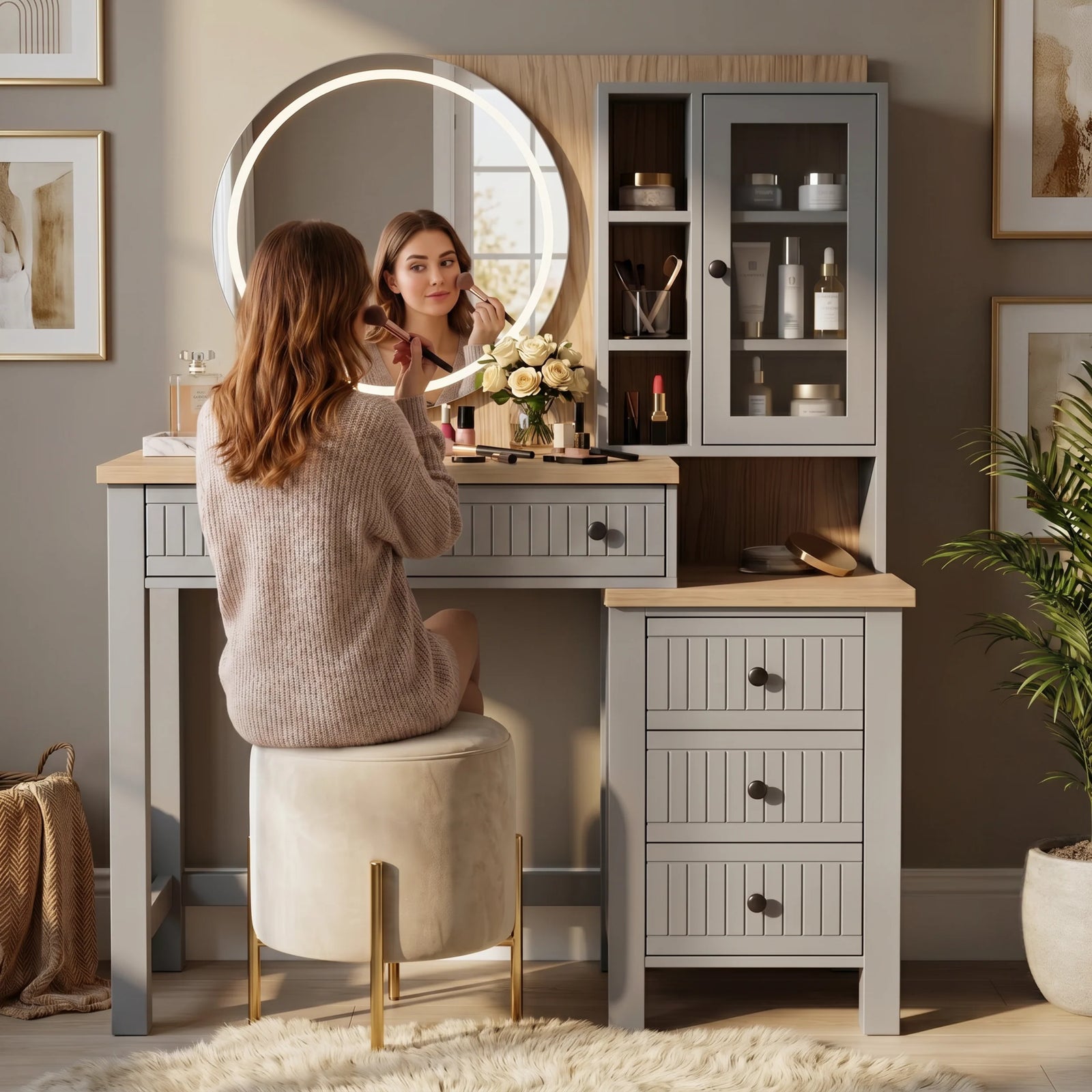 [Grey] Linra Grey Painted Dressing Table with LED Mirror and Storage with a woman sitting on the stool applying makeup.
