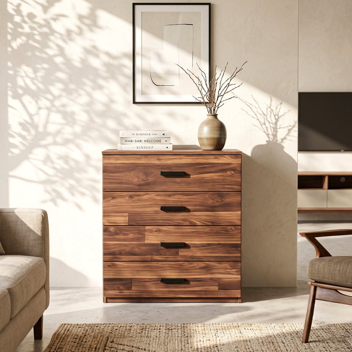 [Dark Bronx] A wooden chest of drawers with four drawers and dark metal handles, styled in a modern living room setting with a vase and books on top.