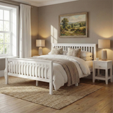 [White | Double] Wooden double bed frame between matching nightstands and lamps with curtains and landscape art on warm wall