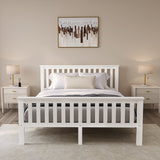 White wooden double bed, offering a timeless and elegant design for a cozy and stylish bedroom.