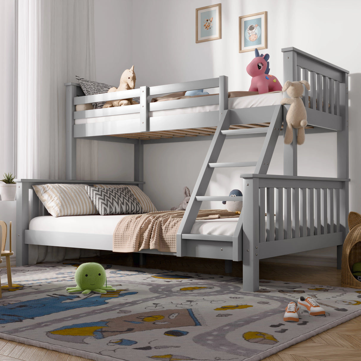 Children's bedroom with a gray and white bunk bed, toys, and a colorful rug.