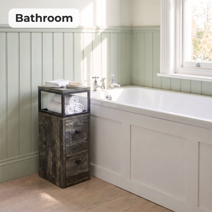 [Rustic Grey] Narrow side table with storage beside a bath, holding towels and toiletries